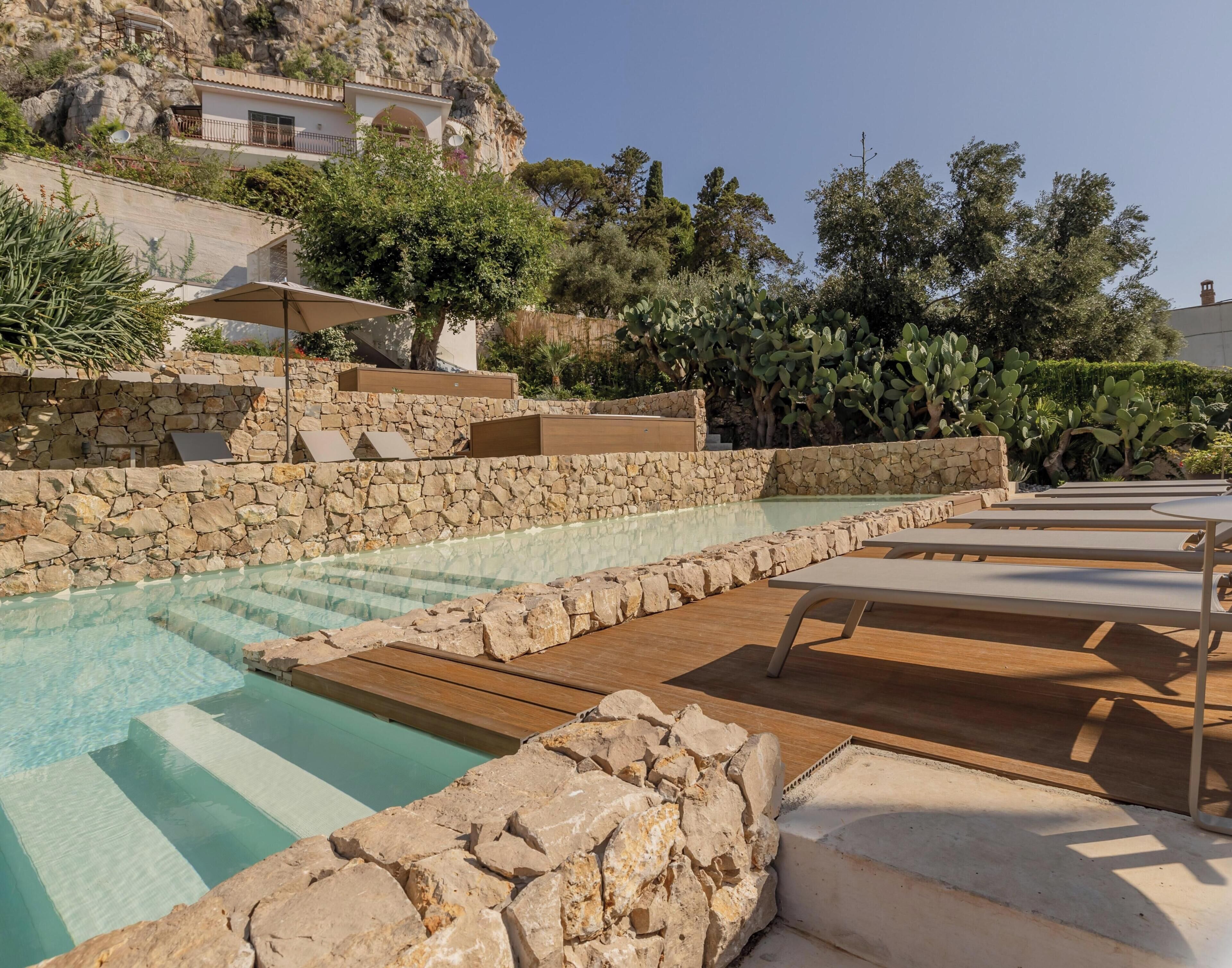 Outdoor pool, open 9:00 AM to 6:00 PM, pool umbrellas, sun loungers