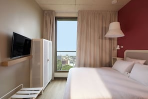 Classic City View Room including self-service snacks and drinks at the Club | View from room