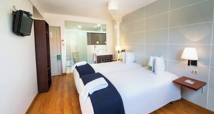 Centrally located private room, across the street from the stadium
