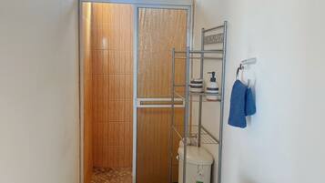 Shower, towels, soap, toilet paper
