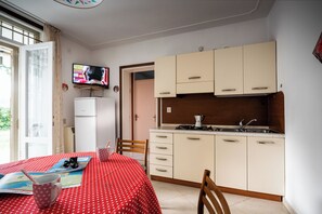Living room - Luminous Apartment With Garden (San Michele al Tagliamento)