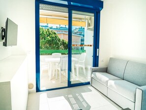 Living room - Enjoy the sun From the Terrace of our Studio (San Michele al Tagliamento)