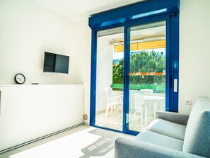 Living room - Enjoy the sun From the Terrace of our Studio (San Michele al Tagliamento)