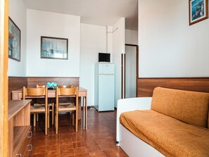 Apartment, 2 Bedrooms, Balcony, Ocean View | Dining room - Coastal Comfort in Lido del Sole With sea View (San Michele al Tagliamento)