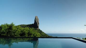 Outdoor pool, open 8:00 AM to 8:00 PM, sun loungers