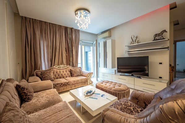 Apartment, 2 Bedrooms, Balcony | Living room | 42-inch flat-screen TV with satellite channels - Tirent Apartment-Spacious 2-Bedroom Stay in Delijorgji Tirana (Tirana)