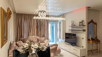 Apartment, 2 Bedrooms, Balcony | Living room | 42-inch flat-screen TV with satellite channels