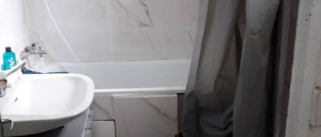 Hair dryer, towels, soap, toilet paper