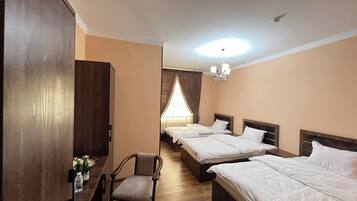 Standard Triple Room, City View | Desk, laptop workspace, iron/ironing board, free WiFi