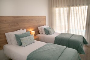 3 slaapkamers, een strijkplank/strijkijzer, gratis wifi, beddengoed