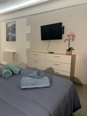 1 chambre, coffres-forts dans les chambres, fer et planche à repasser