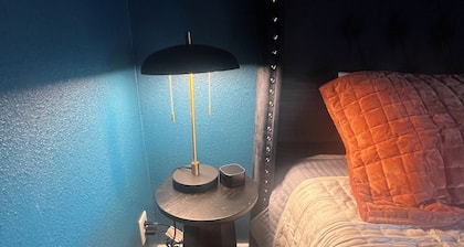 The Birdcage at The Hawk sleeps 10 - 2 bedrooms & 2 1/2 bathrooms.