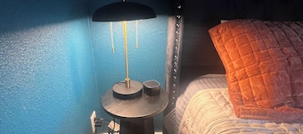 The Birdcage at The Hawk sleeps 10 - 2 bedrooms & 2 1/2 bathrooms.