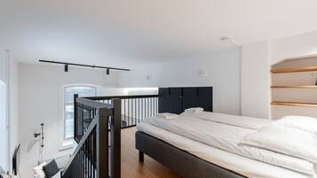 1 bedroom, desk, iron/ironing board, travel crib