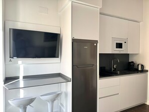 Fridge, microwave, coffee/tea maker, electric kettle