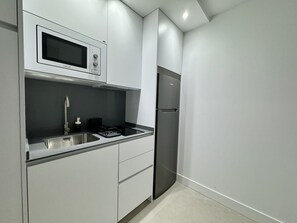 Fridge, microwave, coffee/tea maker, electric kettle