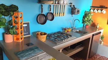Microwave, stovetop, coffee/tea maker, toaster