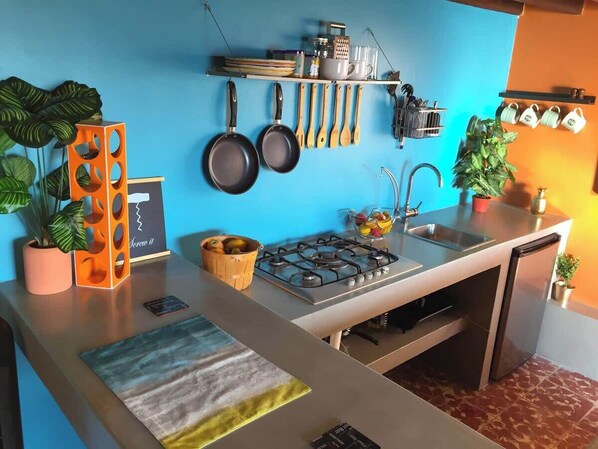 Microwave, stovetop, coffee/tea maker, toaster