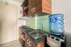 Standard Apartment | Private kitchen - Warm And Cozy Stay Studio Room At Patraland Urbano Apartment (Bekasi)