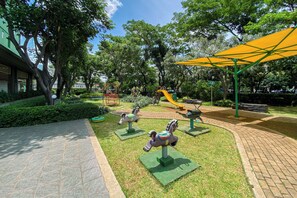 Children’s play area – outdoor - 2Br Green Pramuka City Apartment Near Shopping Center (Jakarta)