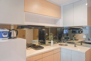 Standard Apartment | Private kitchen - Modern 2Br Apartment Tamansari Iswara (Bekasi)