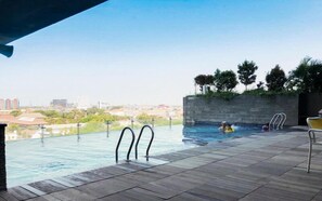 Outdoor pool - Best Price And Relaxing Studio (No Kitchen) At Tamansari Papilio Apartment (Surabaya)