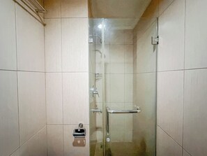 Standard Apartment | Bathroom - Best Price And Relaxing Studio (No Kitchen) At Tamansari Papilio Apartment (Surabaya)