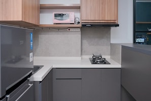 Apartamento standard | Cozinha privada | Geladeira, cooktop