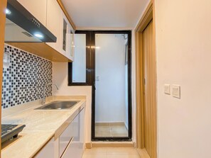 Standard Apartment | Private kitchen | Electric kettle - Comfort And Simply Look 2Br At Meikarta Apartment (Cikarang)