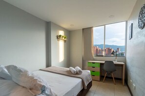 3 bedrooms, desk, iron/ironing board, travel cot