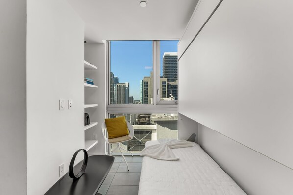 1 bedroom, desk, iron/ironing board, travel cot