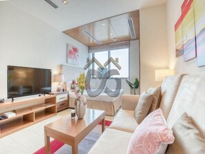 Studio, 1 Bedroom, Balcony, City View | Living area - Restful Studio Apartment in Dubai Sports City (Dubai)