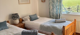 CENTRAL PORTBALLINTRAE coastal bungalow. 