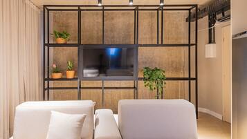 Design Apartment | Living area | Flat-screen TV