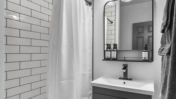 Hair dryer, towels, soap, shampoo