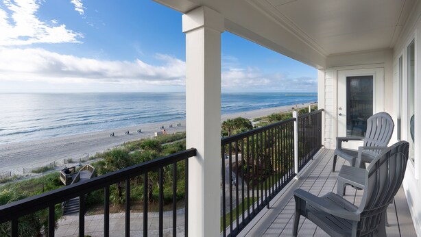 A balcony with a view of the beach and ocean. - Ocean Escape Boardwalk Oceanfront  (Myrtle Beach)