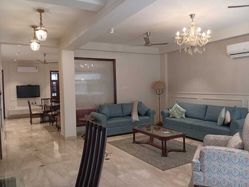 Premium 3-bedroom apartment with Air purifiers, AC, WiFi in Green Park Delhi