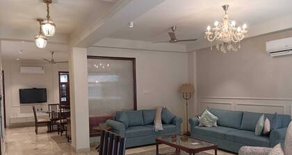Premium 3-bedroom apartment with Air purifiers, AC, WiFi in Green Park Delhi