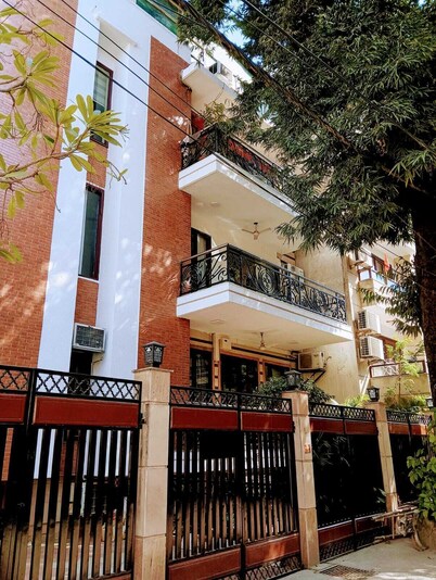 Premium 3-bedroom apartment with Air purifiers, AC, WiFi in Green Park Delhi