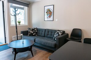 Apartment, Kitchenette, Garden View | Living area | TV - Perchlodge (Monsteras)