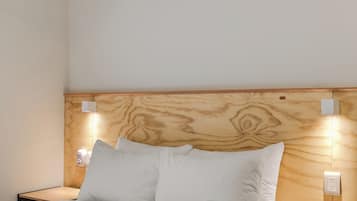 Suite Comfort, pemandangan halaman | 1 kamar tidur, setrika/meja setrika, dan Wi-Fi gratis