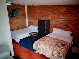 Comfort Twin Room, Courtyard View | Living area | TV