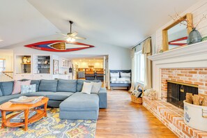 TV, fireplace, books