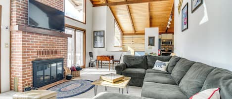 TV, fireplace, table football, books