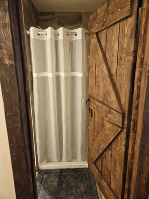 Shower, towels, toilet paper