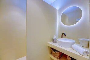 Hair dryer, towels, soap, toilet paper