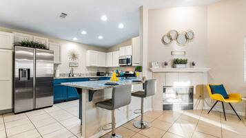 Family House | Private kitchen | Coffee/tea maker, dining tables