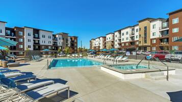 Outdoor pool, open 10:00 AM to 10:00 PM, free pool cabanas