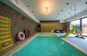 Indoor pool, open 9:00 AM to 10:00 PM, sun loungers
