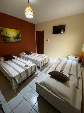 Standard Triple Room, 3 Twin Beds | Blackout drapes, iron/ironing board, bed sheets - Residencial Dragão (Fortaleza)